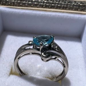 Blue topaz/ diamond ring